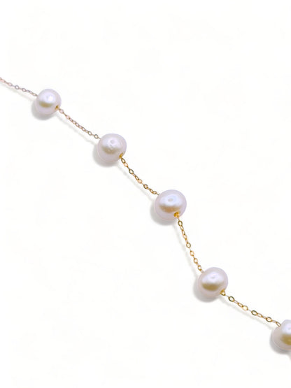 Solid 18ct Gold Women's Pearl Bracelet, top down photo