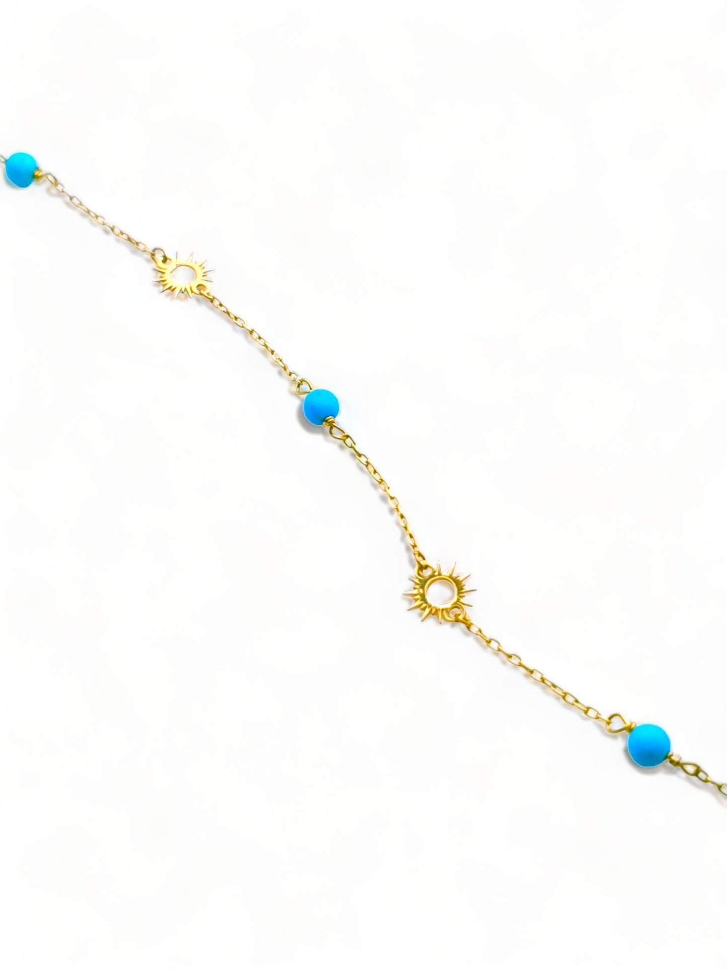 Solid 18ct Gold Women's Sun & Turquoise Bead Bracelet, top down photo