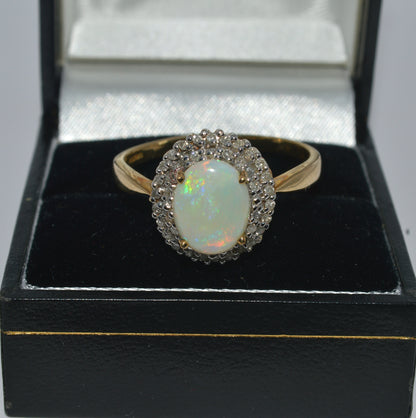 9ct Gold - Opal & Double Row Diamond Cluster Ring top down front