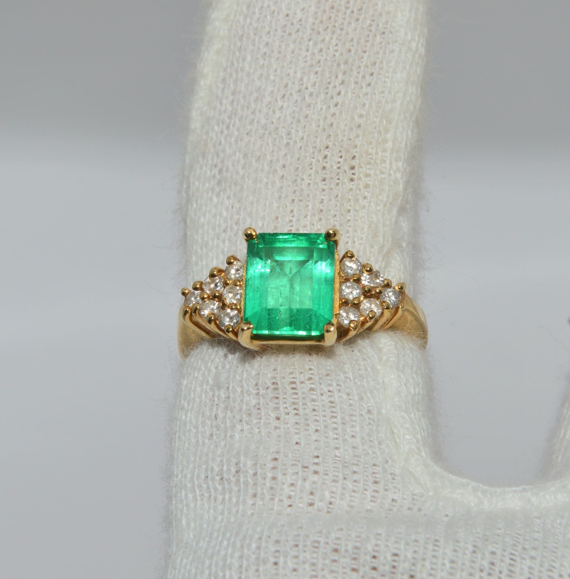 18ct Gold - Colombian Emerald & Diamond Ring top down finger