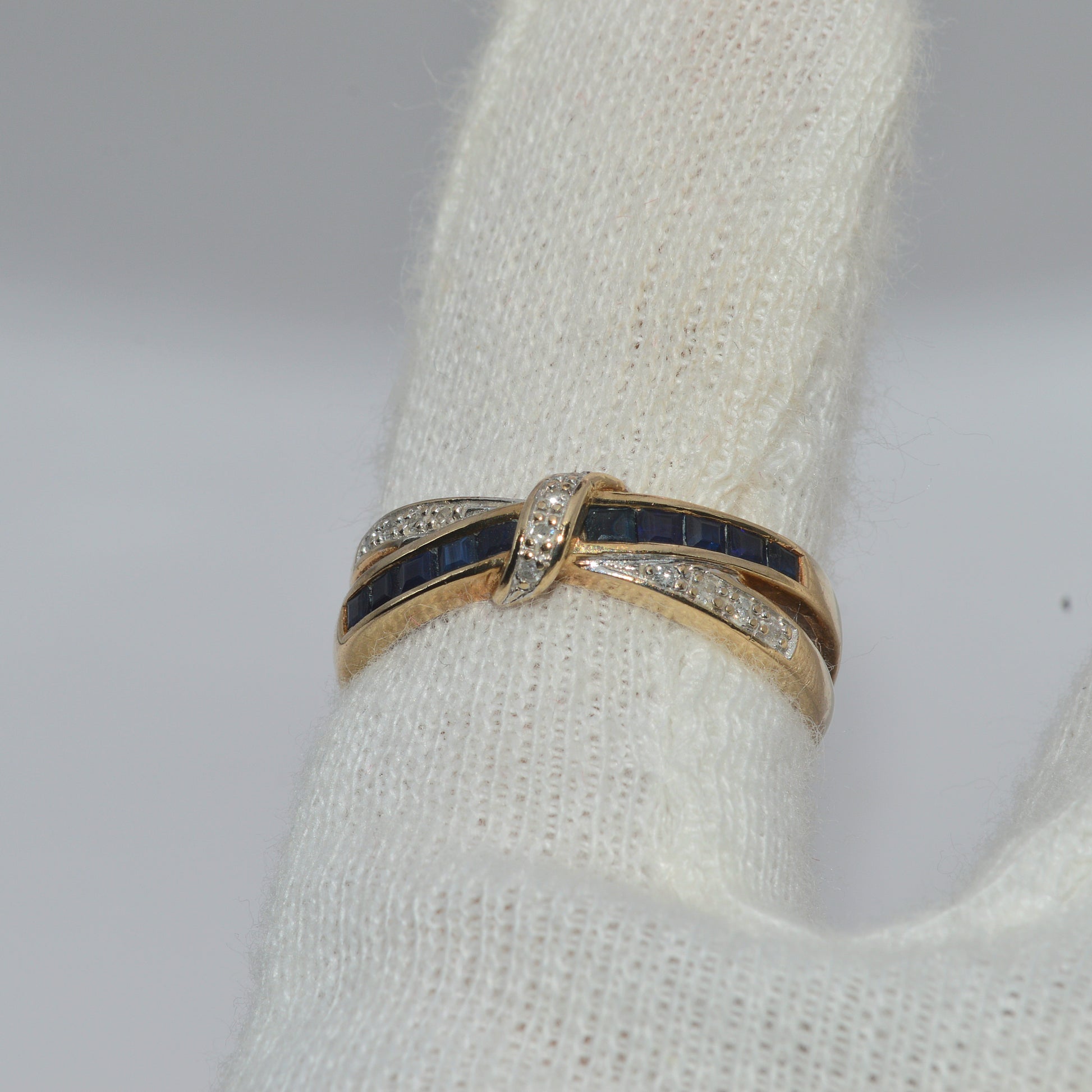 9ct Gold - Sapphire & Diamond Crossover Ring finger top down