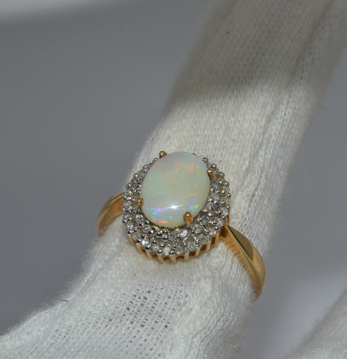 9ct Gold - Opal & Double Row Diamond Cluster Ring finger left