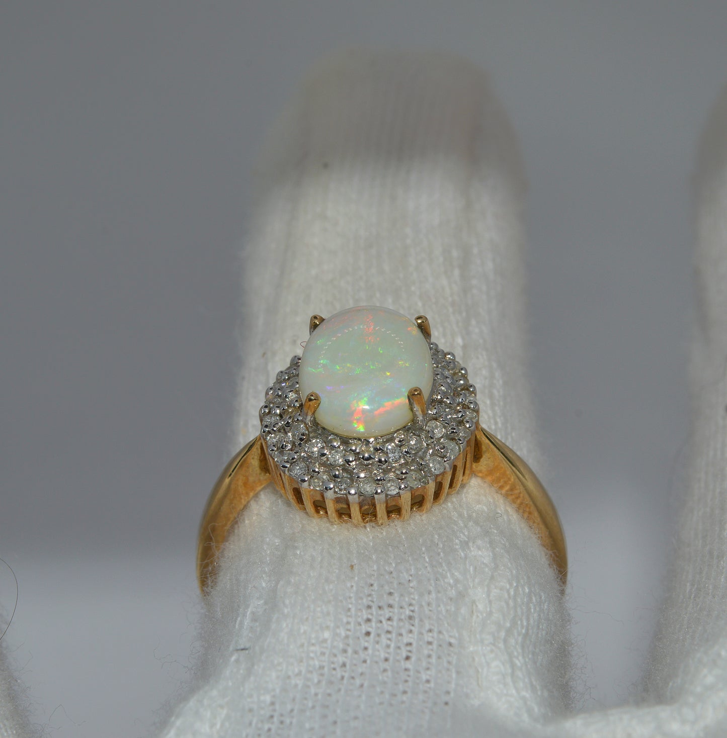 9ct Gold - Opal & Double Row Diamond Cluster Ring finger rear on