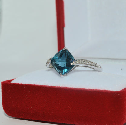 9ct White Gold - Blue Topaz & Diamond Ring left tilt