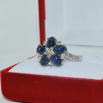 2005 - 9ct White Gold - Sapphire Cabochon & Diamond Cluster Ring left