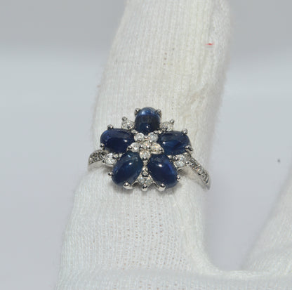 2005 - 9ct White Gold - Sapphire Cabochon & Diamond Cluster Ring finger 