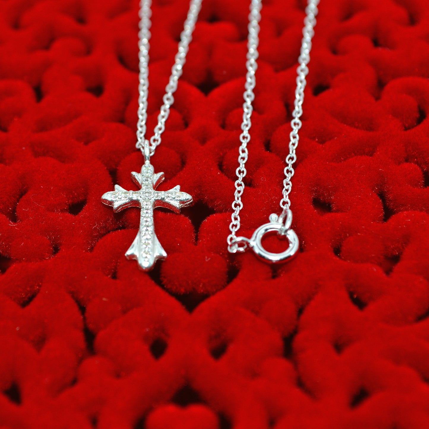 Sterling Silver - Cz Cross Necklace top down on top of box