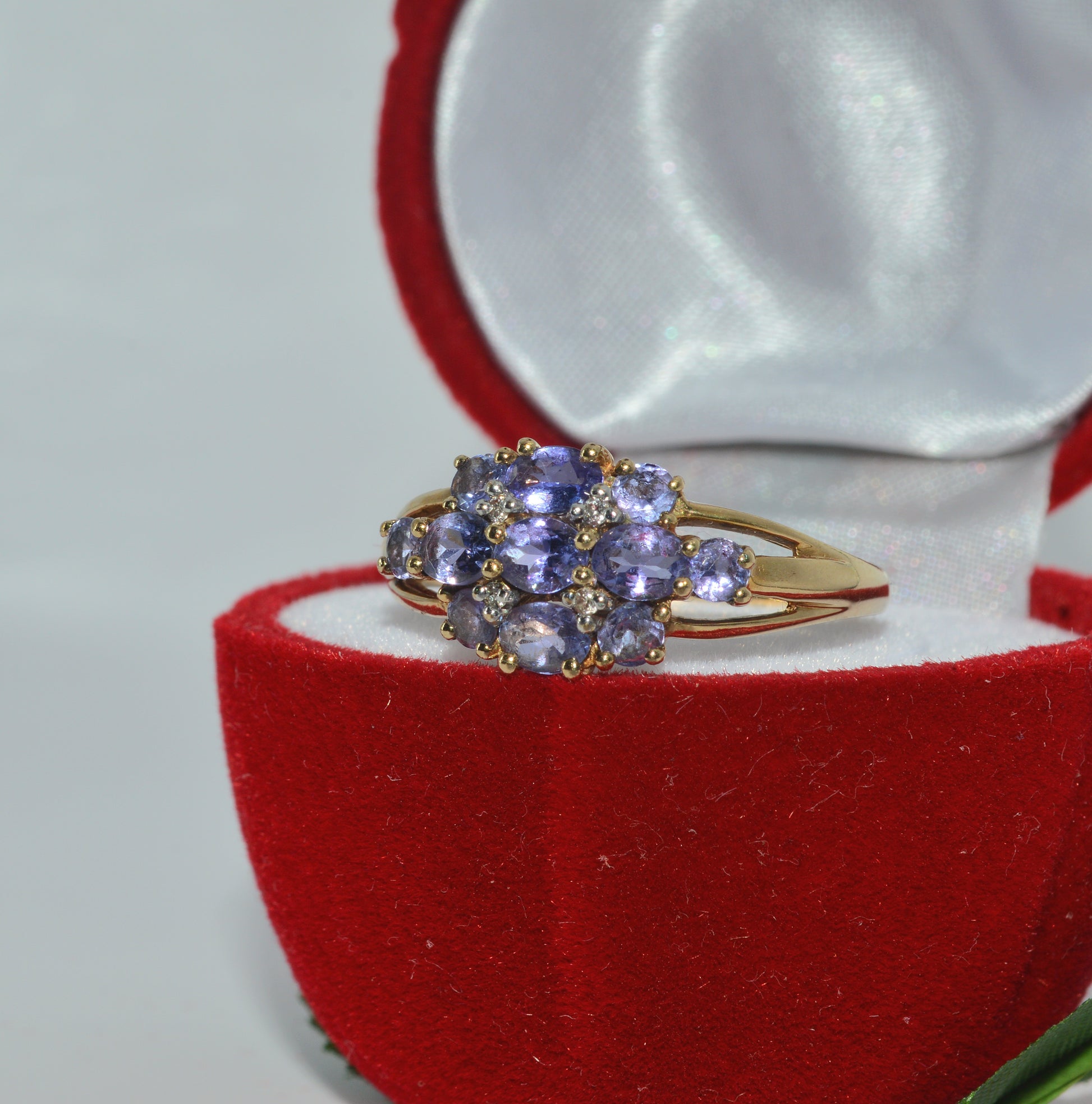 2006 - 9ct Gold - Diamond & Tanzanite Cluster Ring left