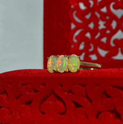 9ct Gold - Ethiopian Opal Trilogy Ring left