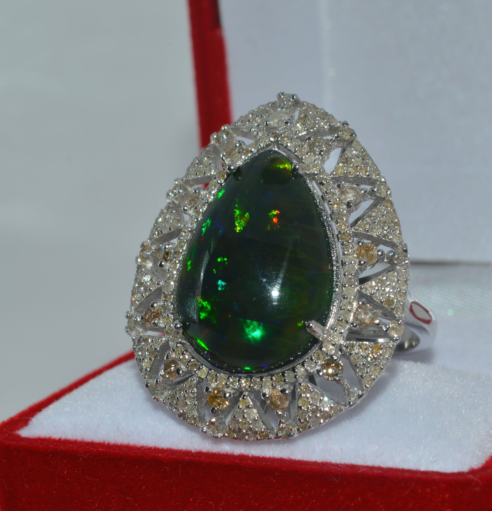 Silver - 6.15ct Pear Cut Black Opal & 1.4ct Diamond Cluster Ring left