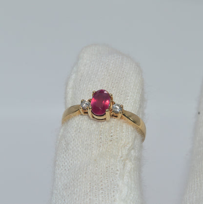 9ct Gold - Ruby & Diamond Trilogy Ring finger top down