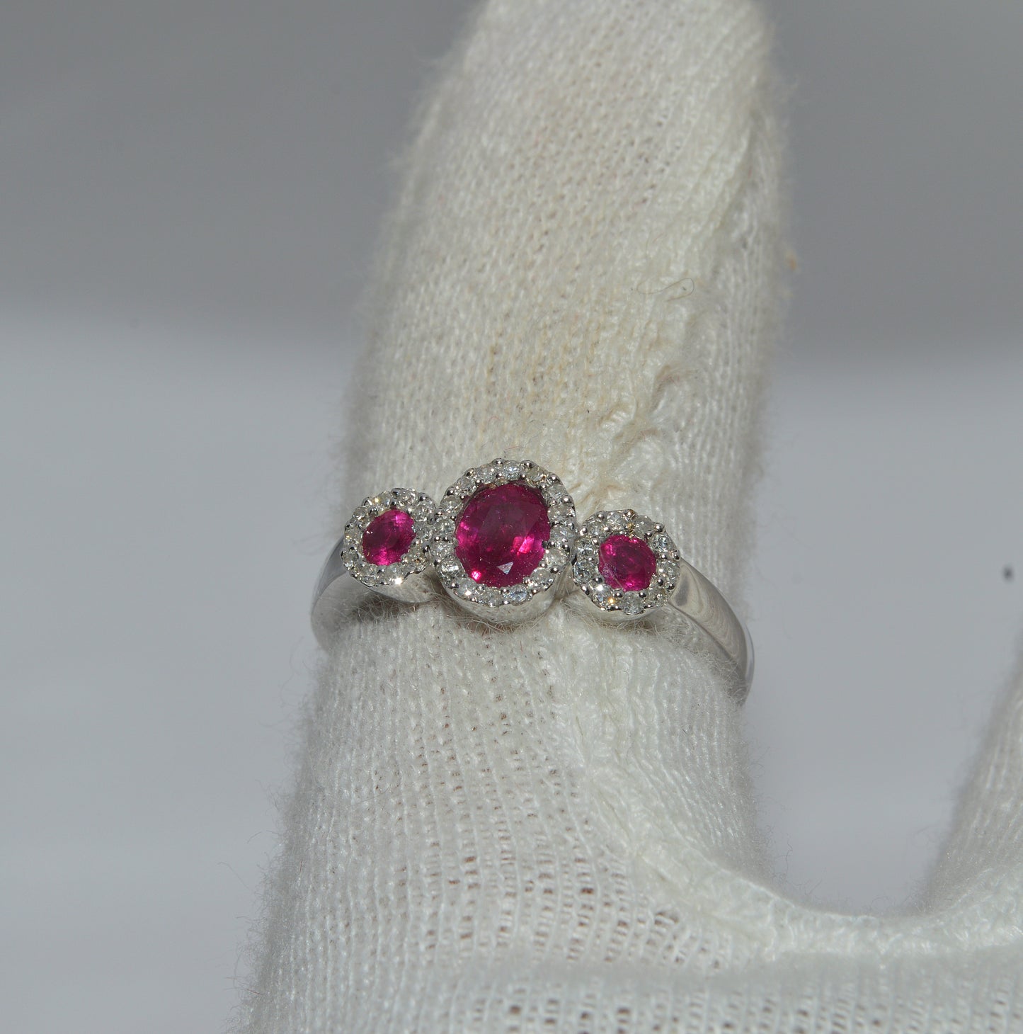 18ct White Gold - Ruby & Diamond Trilogy Ring finger top down