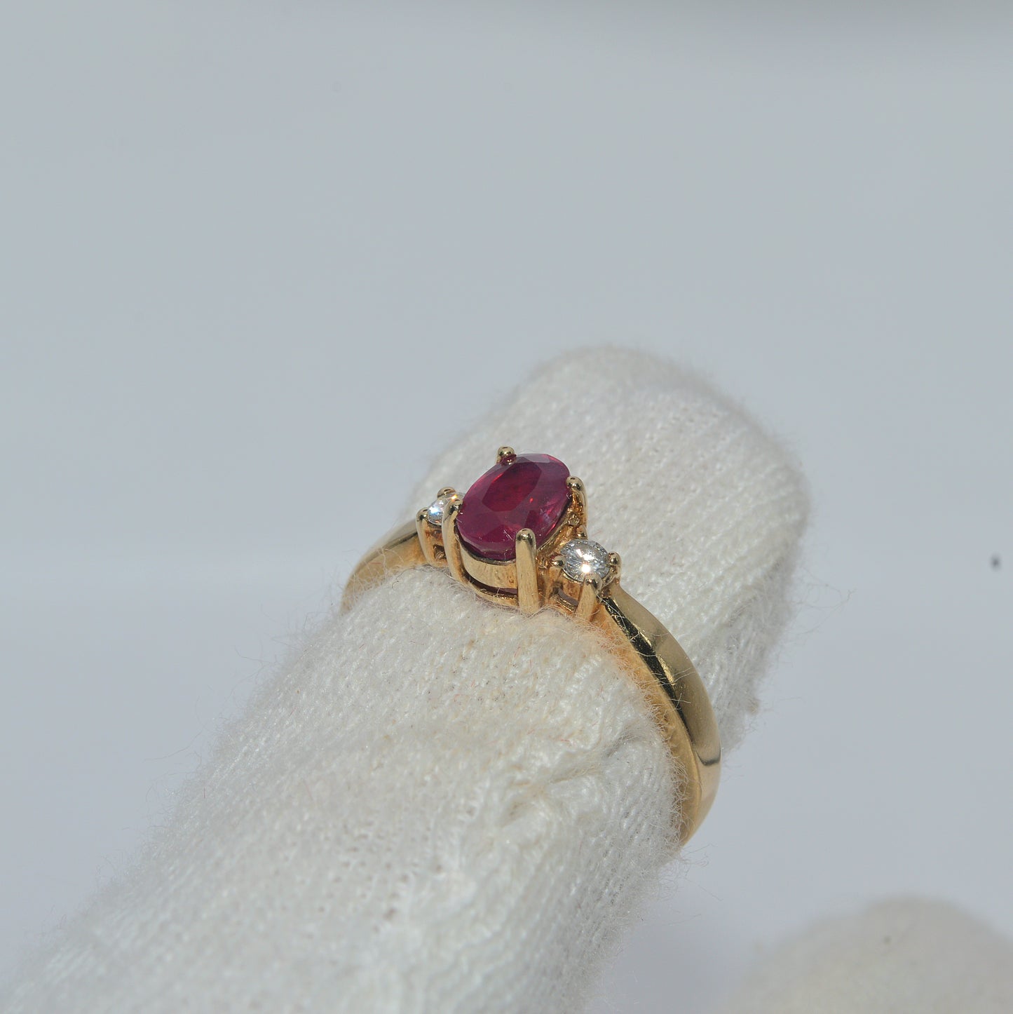 9ct Gold - Ruby & Diamond Trilogy Ring fimger right tilt