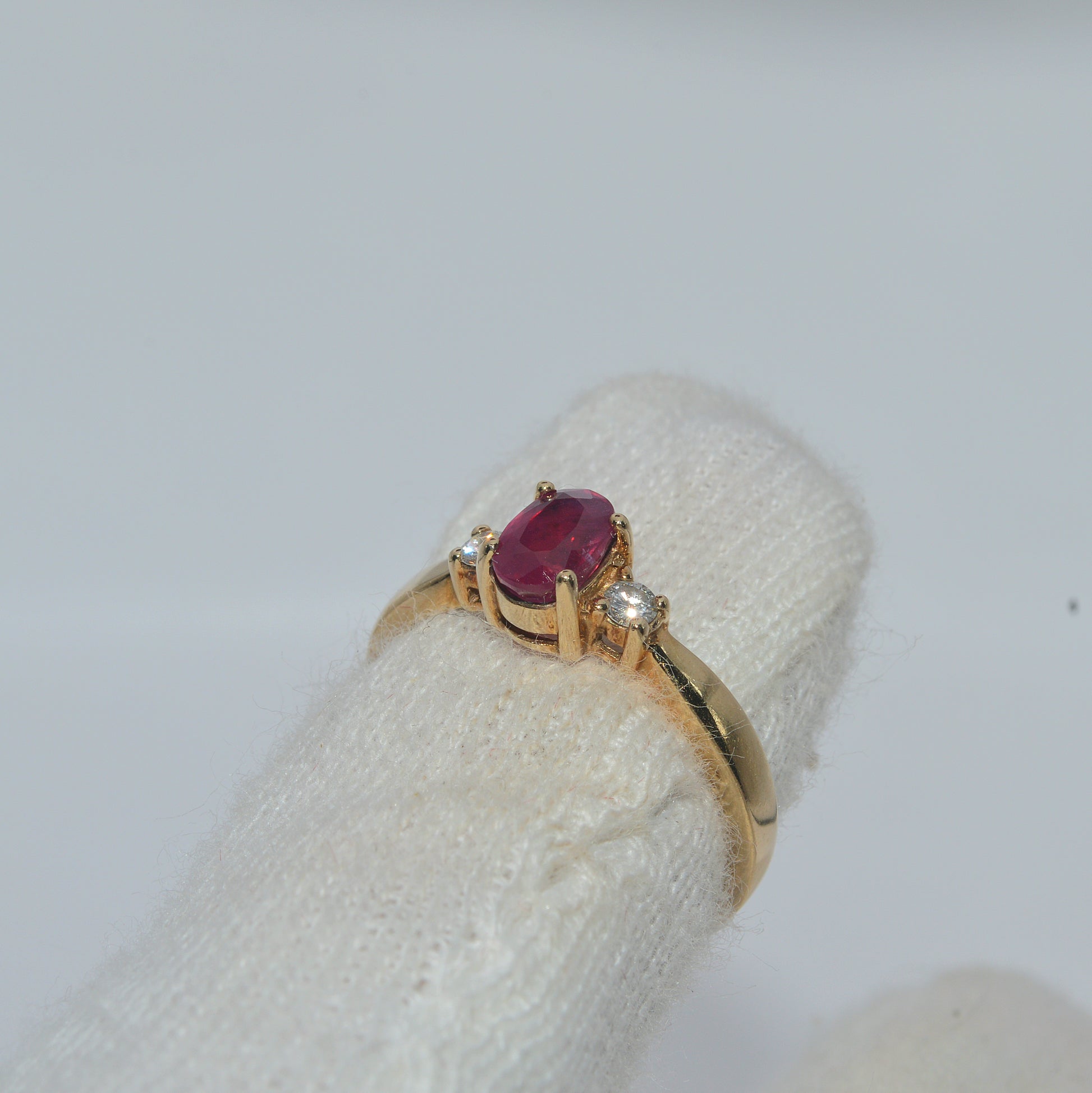 9ct Gold - Ruby & Diamond Trilogy Ring fimger right tilt