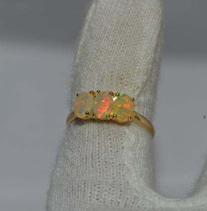 9ct Gold - Ethiopian Opal Trilogy Ring finger top