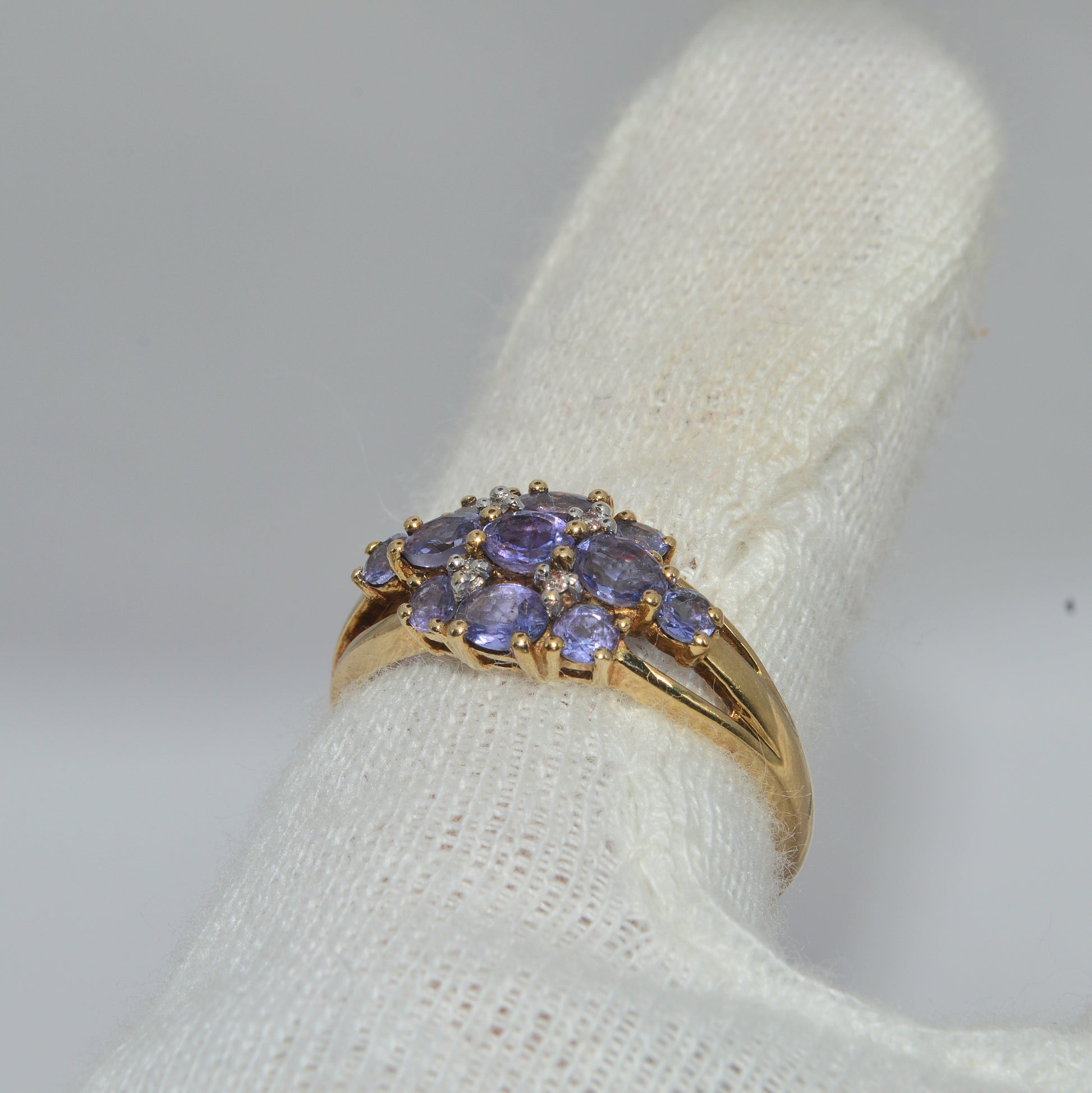 2006 - 9ct Gold - Diamond & Tanzanite Cluster Ring finger left