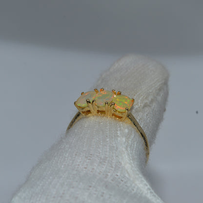 9ct Gold - Ethiopian Opal Trilogy Ring finger rear