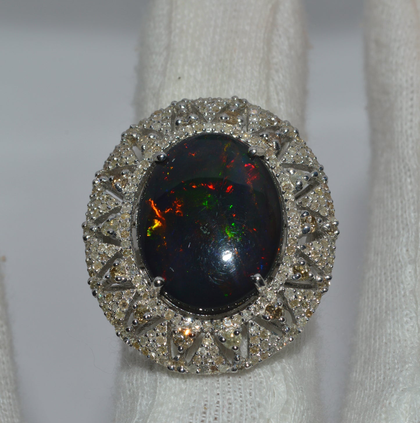 Silver - 6.33ct Black Opal & 1.32ct Diamond Cluster Ring finger top down