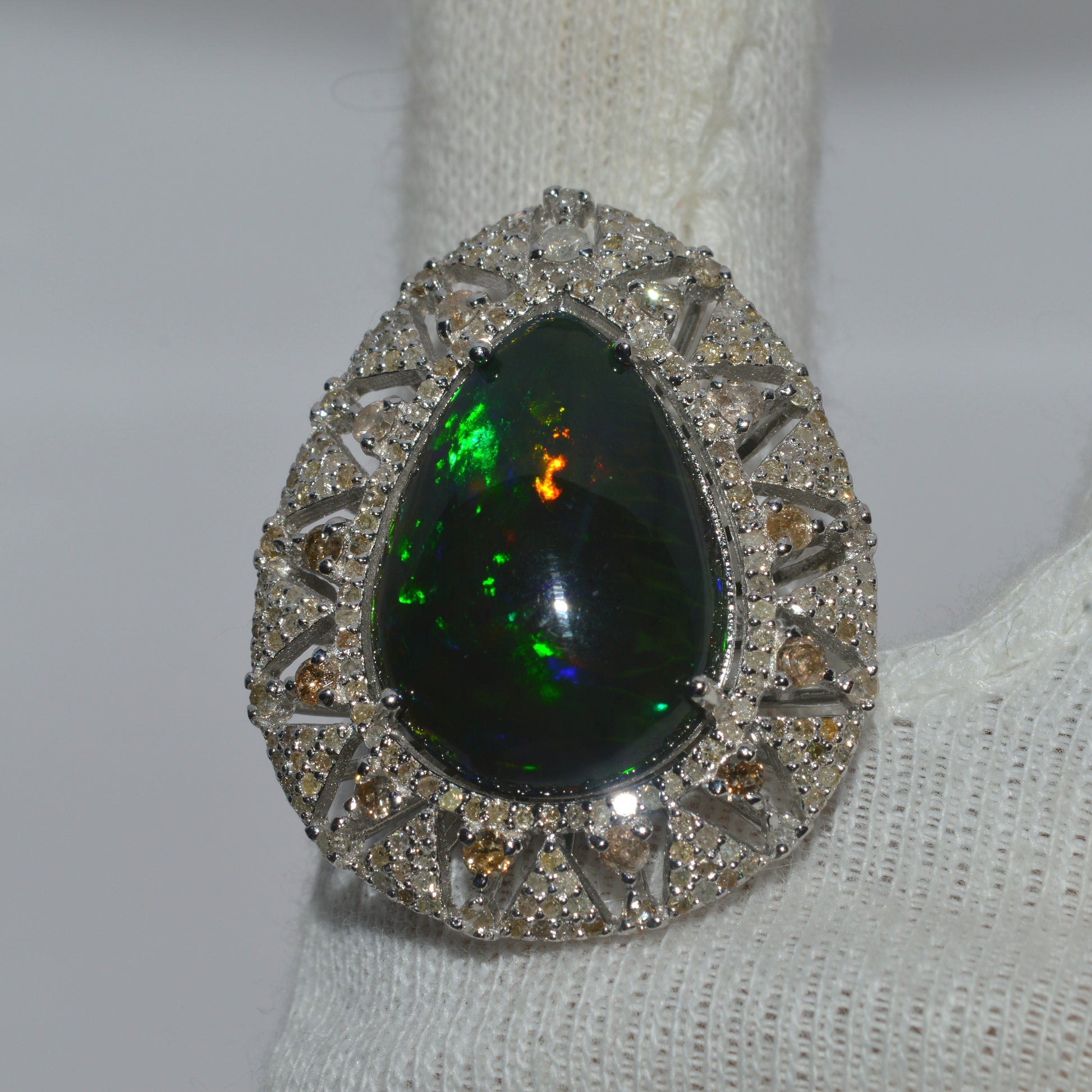 Silver - 6.15ct Pear Cut Black Opal & 1.4ct Diamond Cluster Ring finger top down