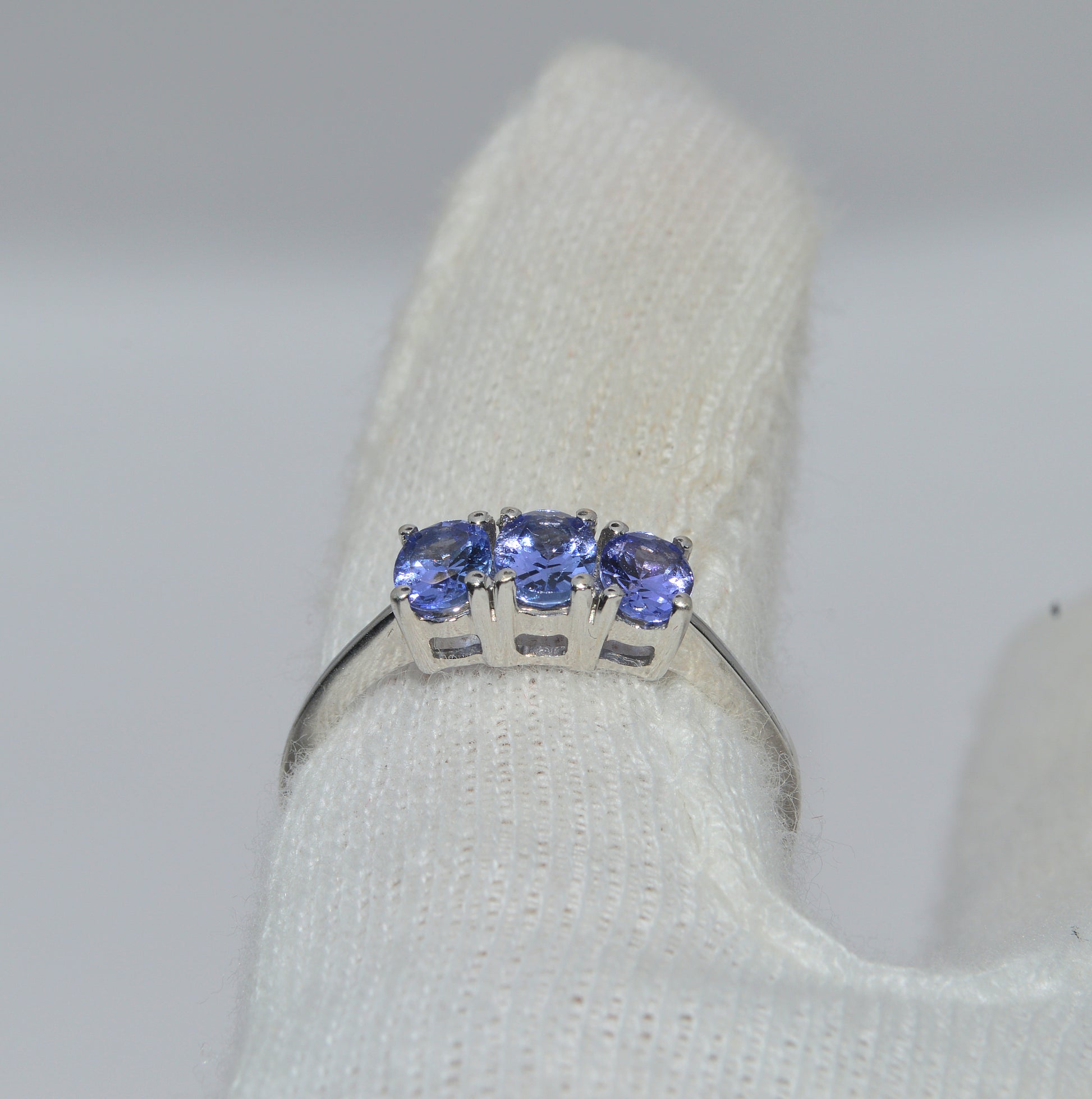 9ct White Gold - Tanzanite Trilogy Ring finger rear