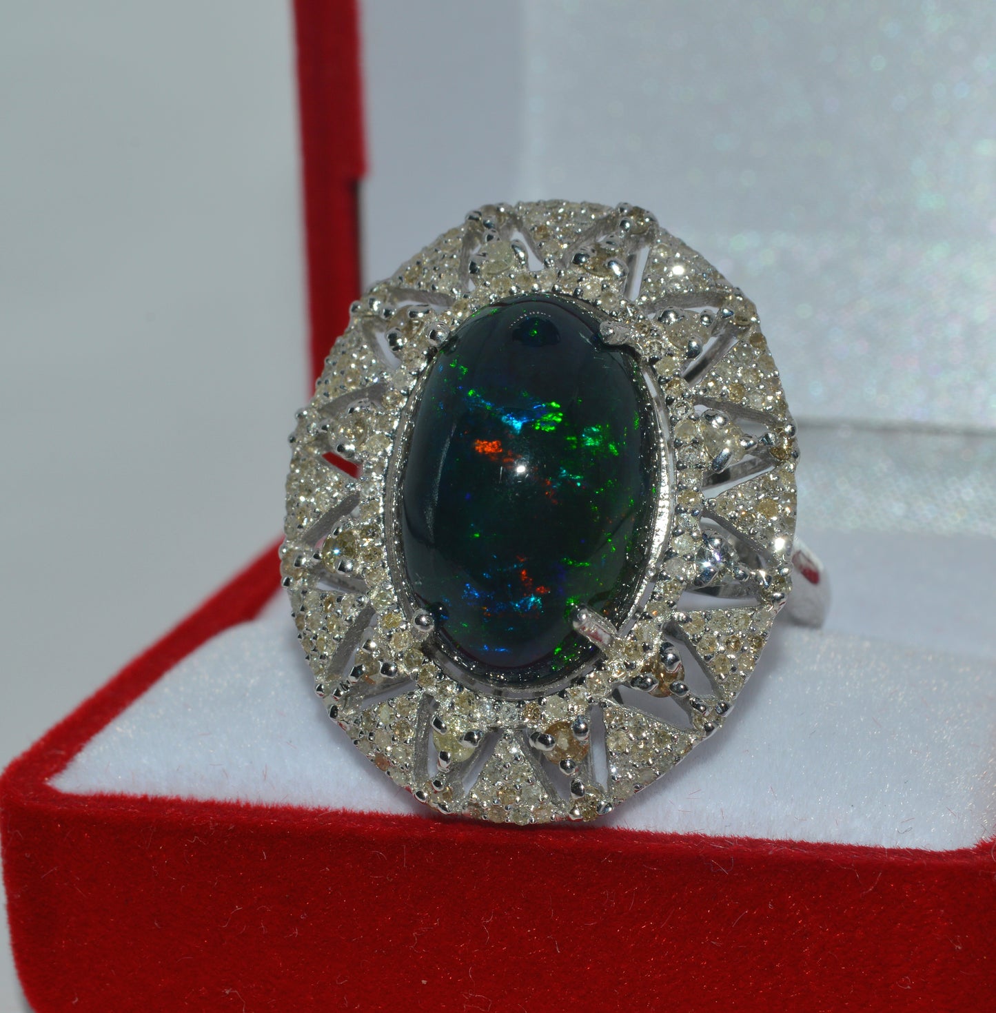 Silver - 7.09ct High Dome Black Opal & 1.5ct Diamond Cluster Ring front left