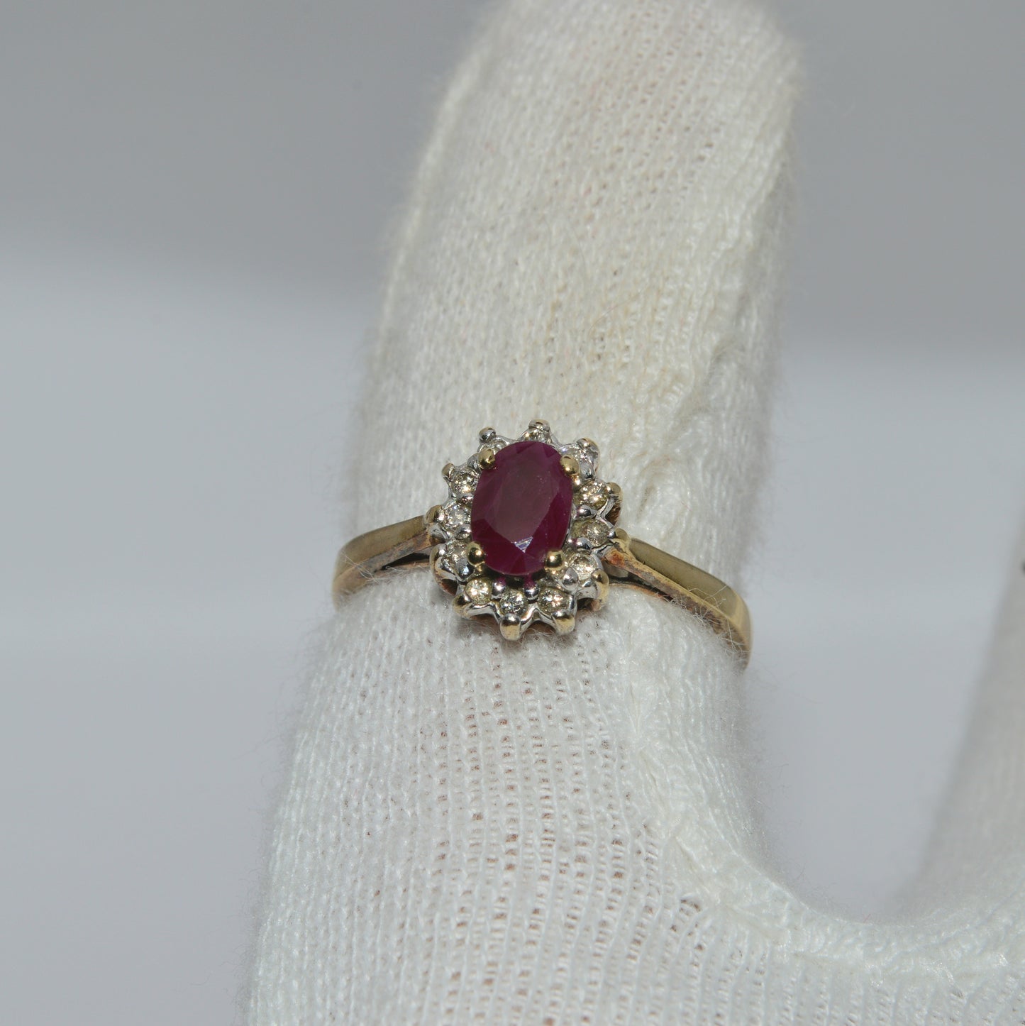 9ct Gold - Ruby & Diamond Cluster Ring finger top down