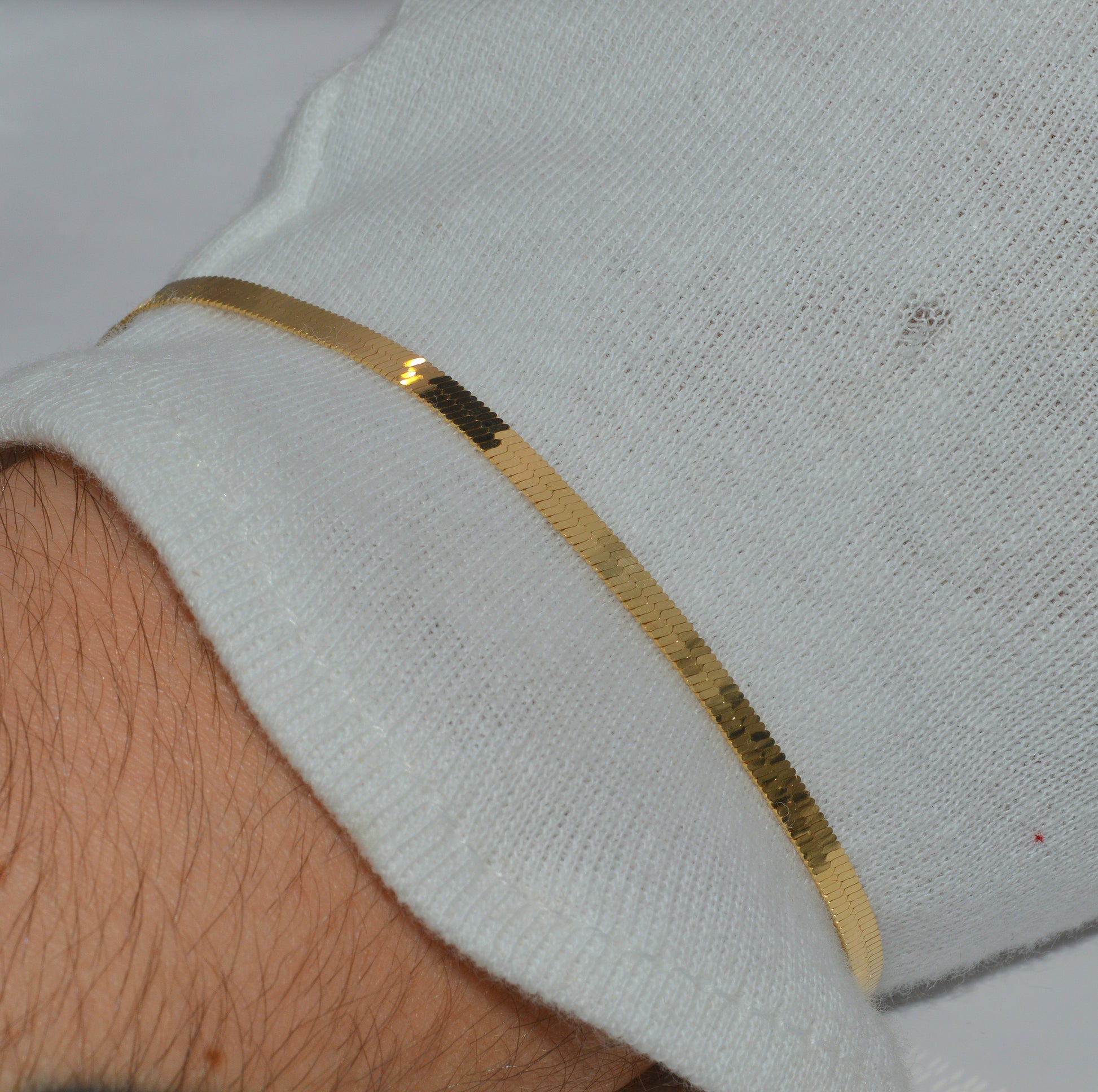 18ct Gold Herringbone Bracelet wrist close