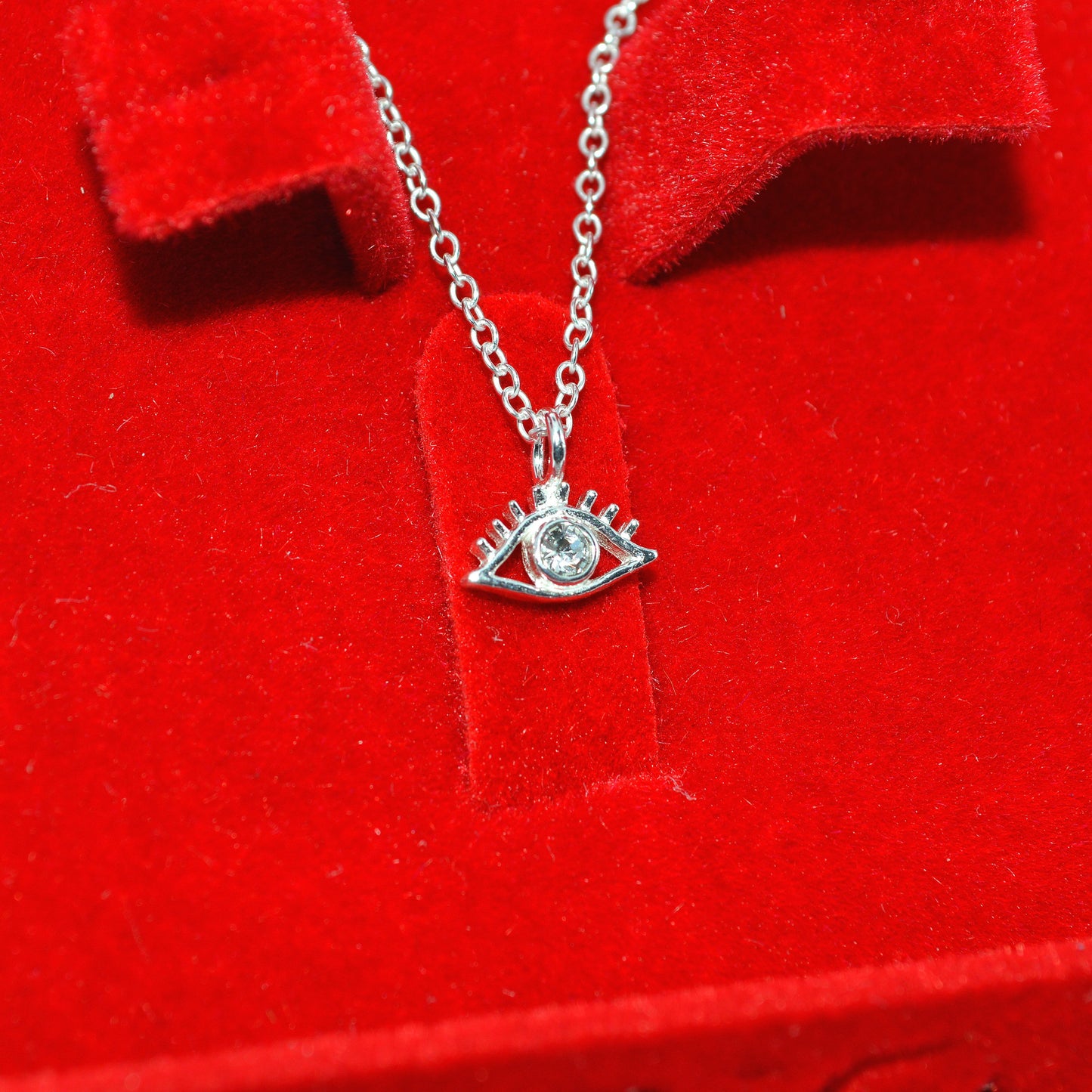 Sterling Silver - Crystal Evil Eye Necklace right tilt inside box