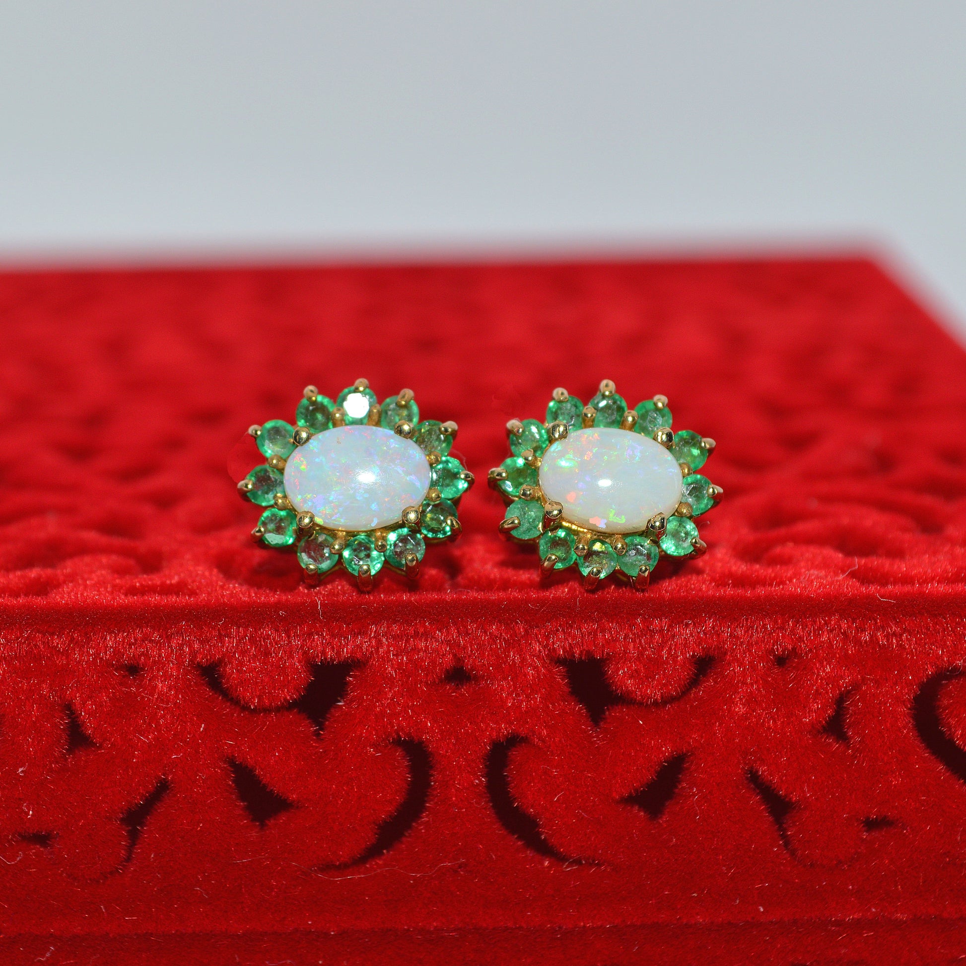 9ct Gold - Opal & Emerald Earrings opal in focus