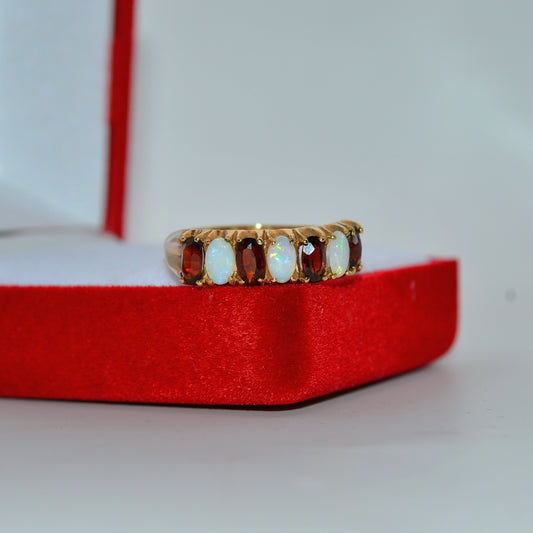 antique 9ct gold opal & garnet ring tilted left