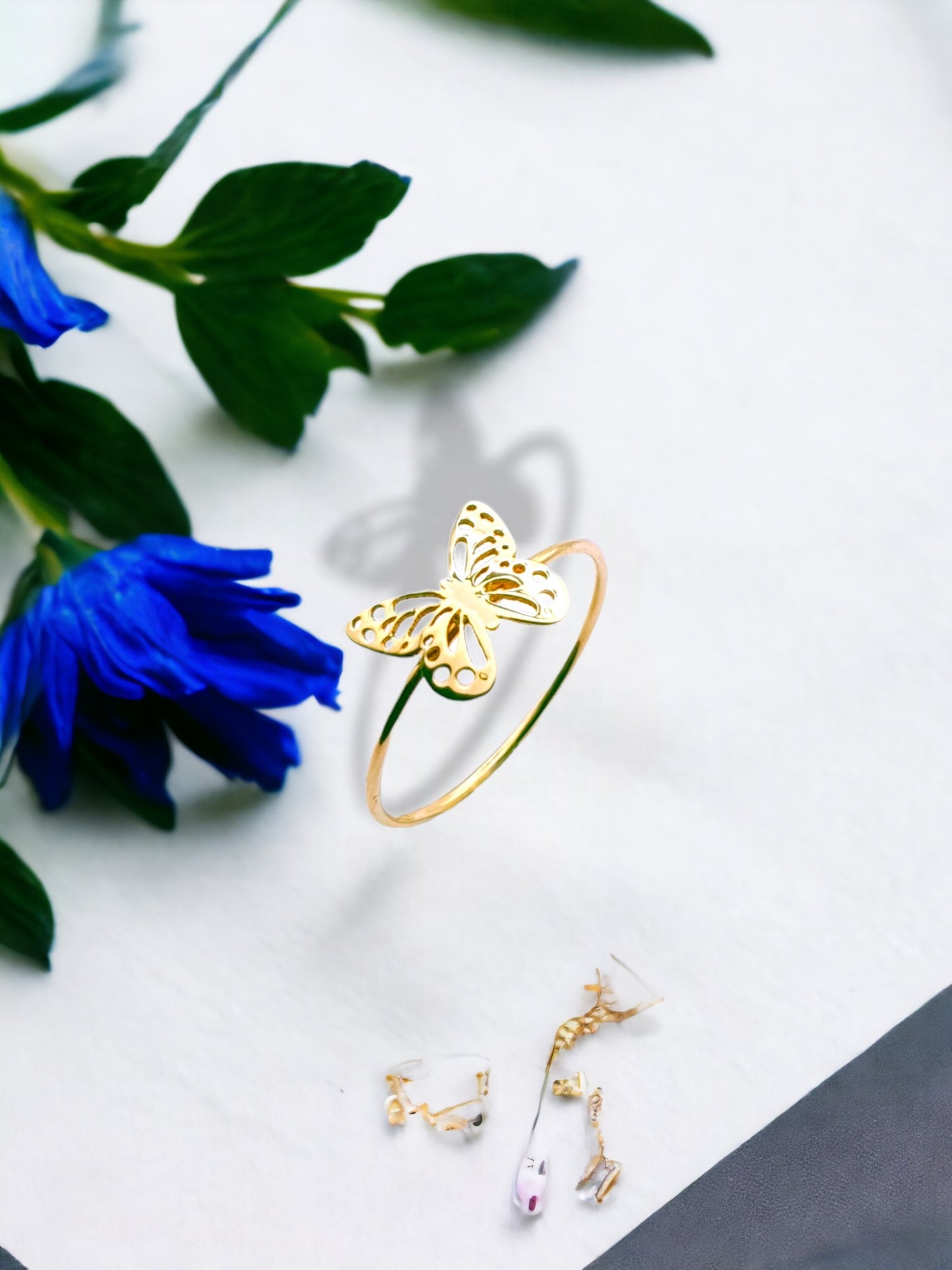 Solid 18ct gold women's butterfly ring, lifestyle picture