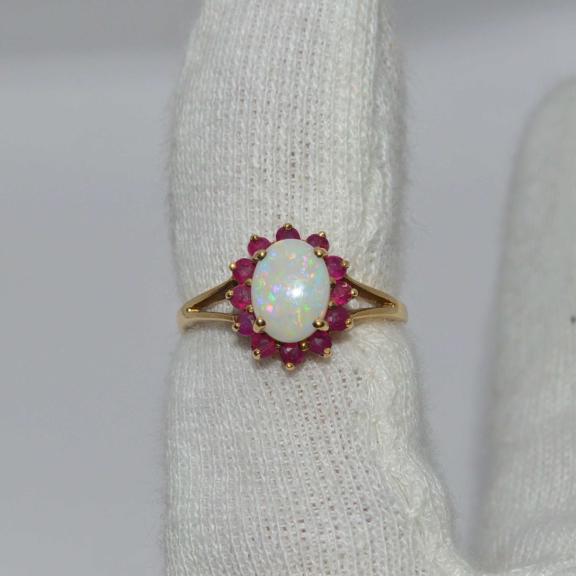9ct Gold - Opal & Ruby Ring finger top down