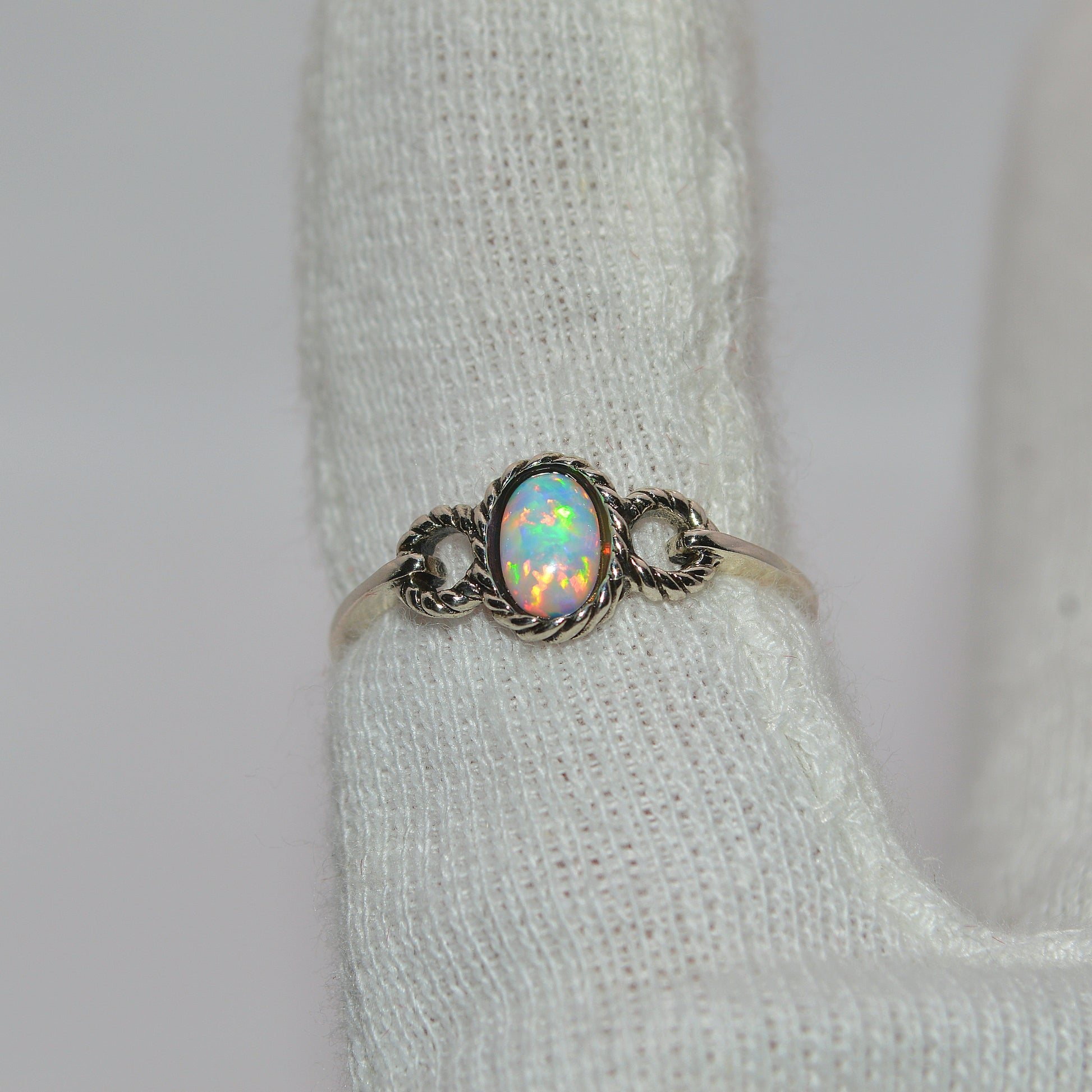 Sterling Silver - Opal Twist Ring finger top down