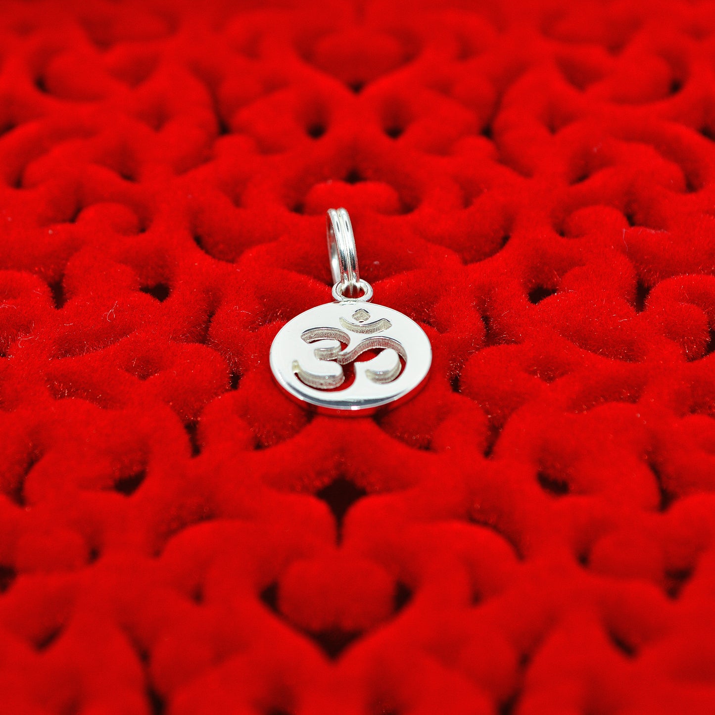 Sterling Silver - Om Charm angled down close