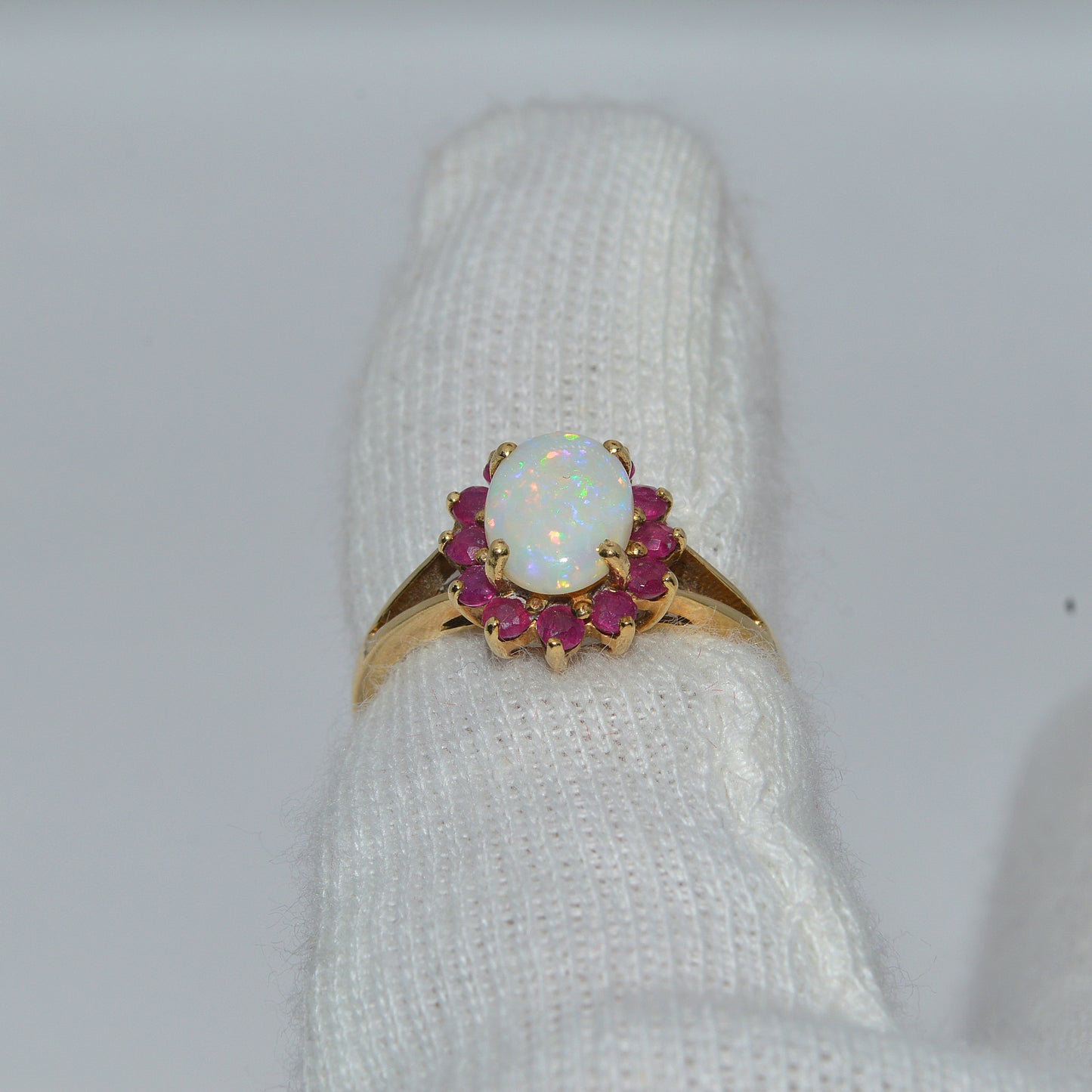 9ct Gold - Opal & Ruby Ring finger rear on