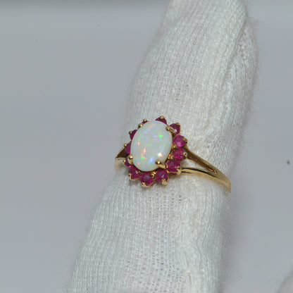 9ct Gold - Opal & Ruby Ring finger left tilt