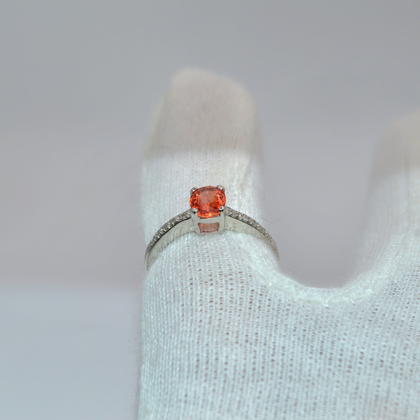 9ct White Gold - Orange Sapphire & Diamond Ring cocked finger