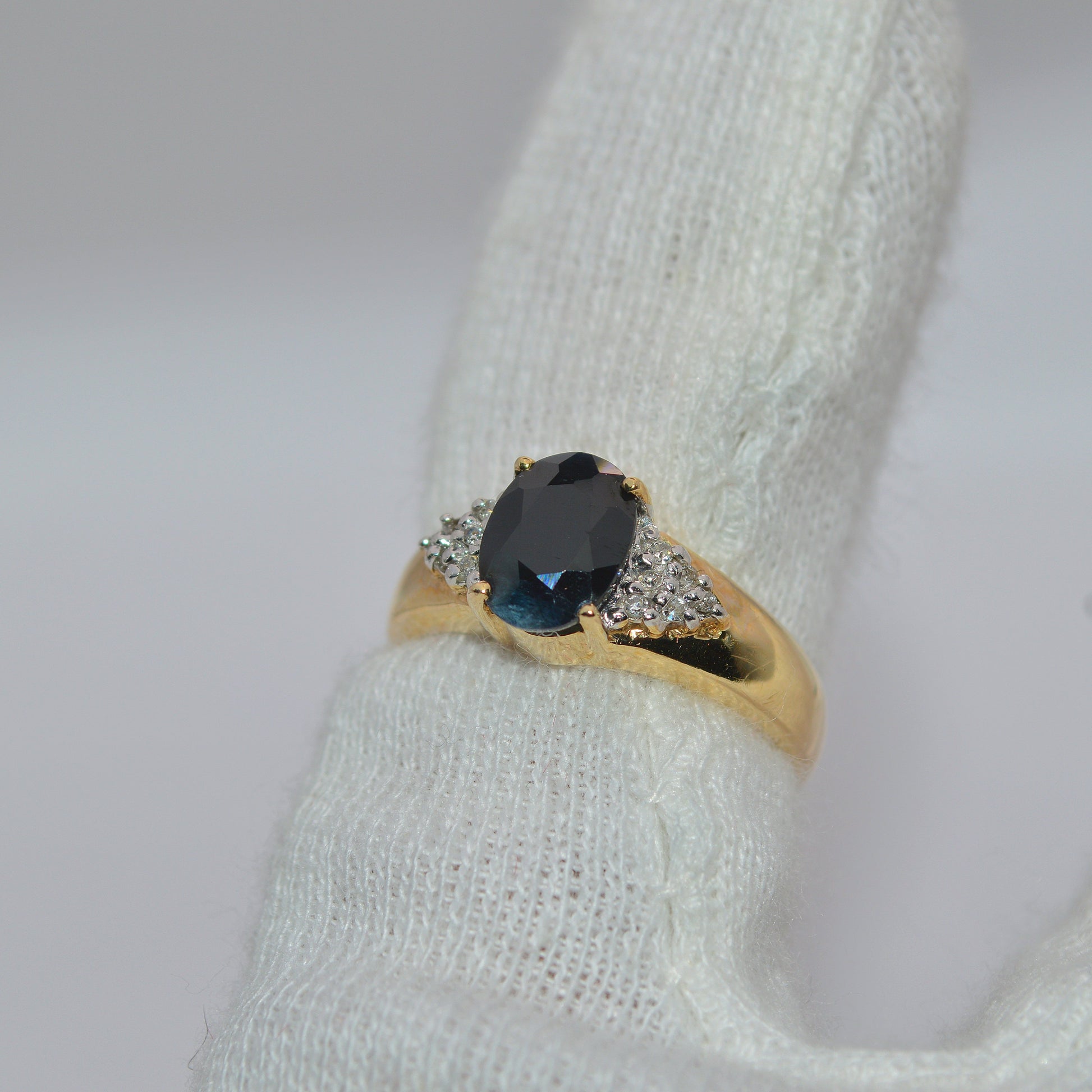 9ct Gold - Sapphire & Diamond Ring left tilt finger