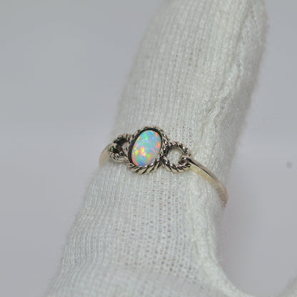 Sterling Silver - Opal Twist Ring left tilt finger